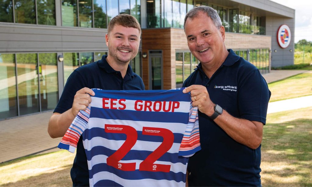 EES Group CEO and Son accepting Reading FC signed football shirt